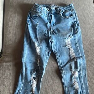 Light ripped jeans good condition.